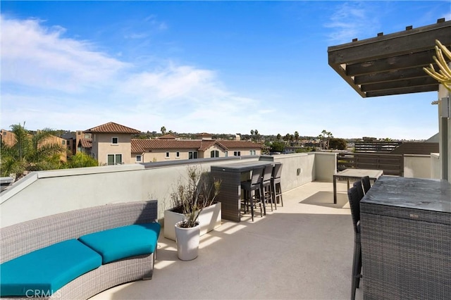 view of patio with an outdoor bar and an outdoor hangout area