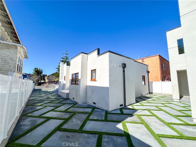 view of home's exterior featuring a patio