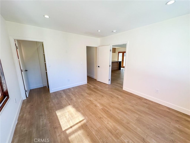 unfurnished bedroom with light hardwood / wood-style floors