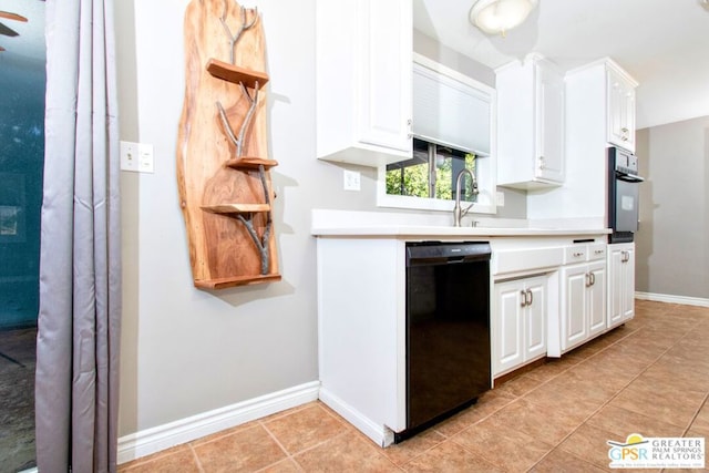 kitchen with white cabinetry, sink, light tile patterned floors, and black appliances