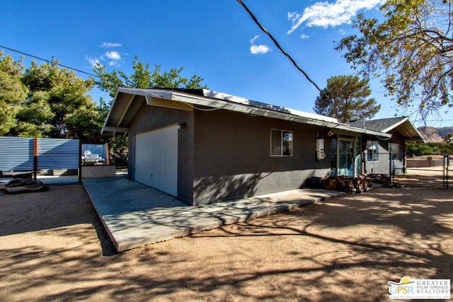 view of home's exterior featuring a garage