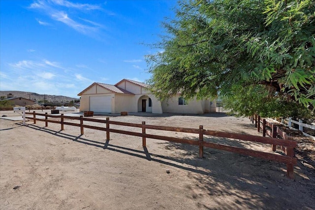 view of front of house with a garage