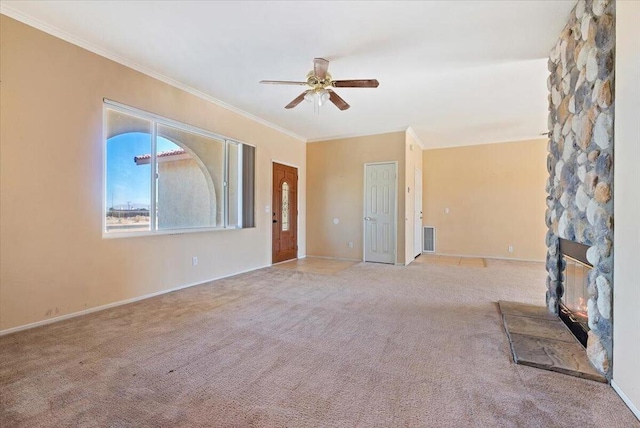 unfurnished living room with light colored carpet and ceiling fan