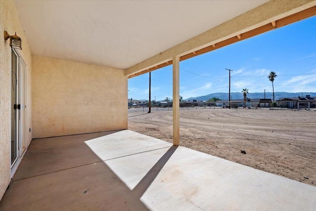 view of patio with a mountain view