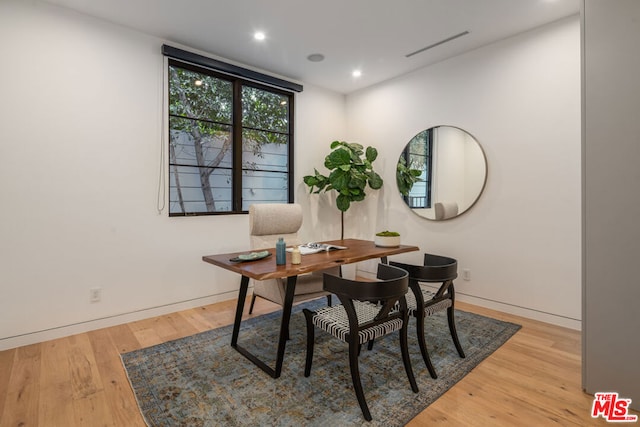 office space with light hardwood / wood-style flooring