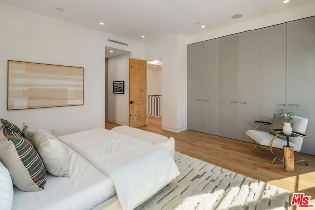 bedroom featuring light hardwood / wood-style floors