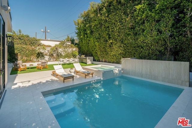 view of swimming pool with an in ground hot tub, an outdoor living space, and a patio