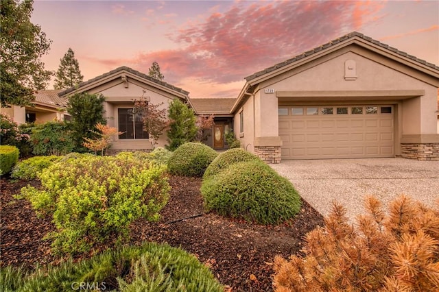 ranch-style home with a garage