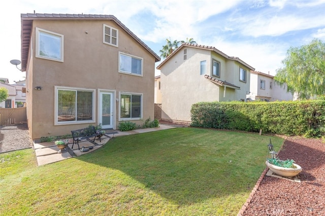 197 Lydia Ln, Corona, CA 92882 - back of house featuring stucco siding and a patio area