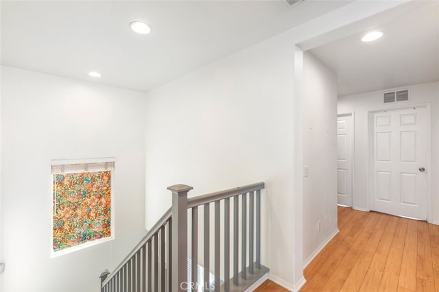 197 Lydia Ln, Corona, CA 92882 - hallway featuring an upstairs landing, light wood-style flooring, recessed lighting, and baseboards