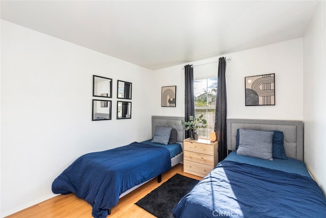 bedroom featuring hardwood / wood-style floors