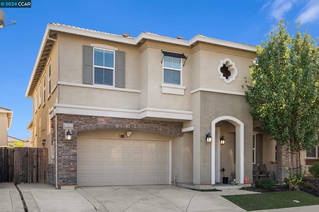 view of front of property with a garage