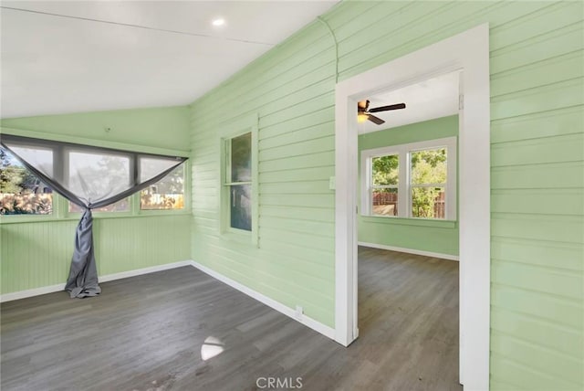 interior space with ceiling fan and lofted ceiling