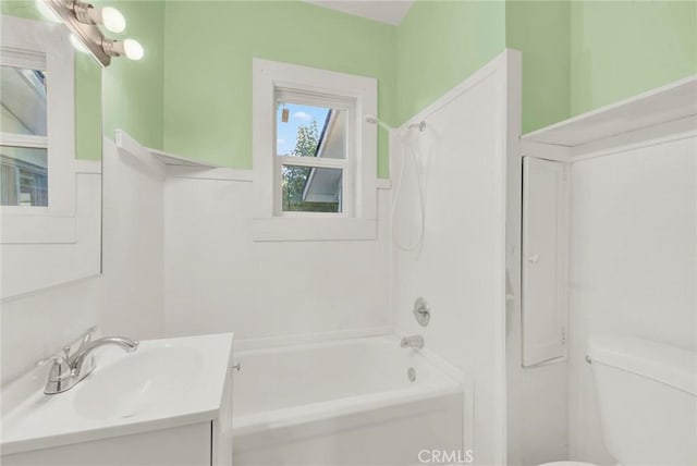 full bathroom featuring vanity, toilet, and shower / bath combination