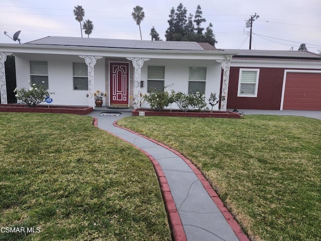 single story home featuring a garage, a porch, and a front yard