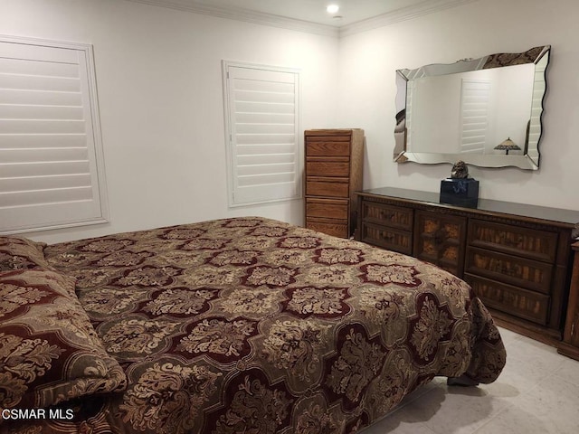 bedroom with crown molding