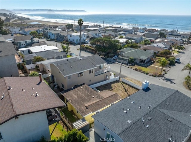 aerial view with a beach view and a water view