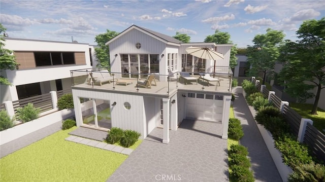 view of front of home featuring a sunroom