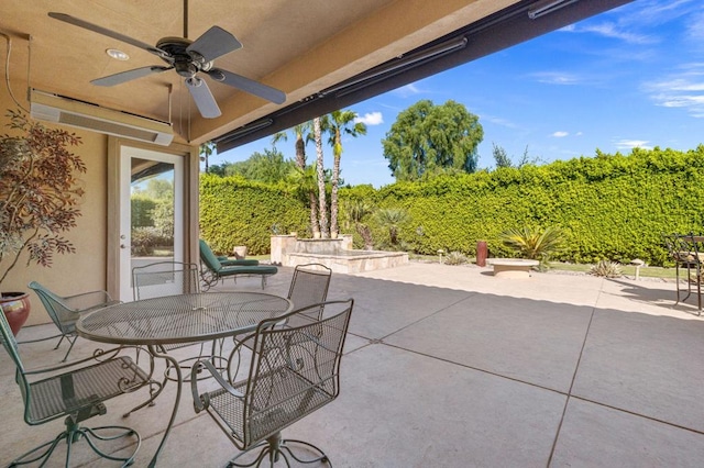 view of patio with ceiling fan