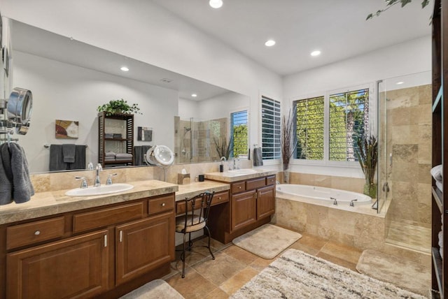 bathroom with vanity and plus walk in shower