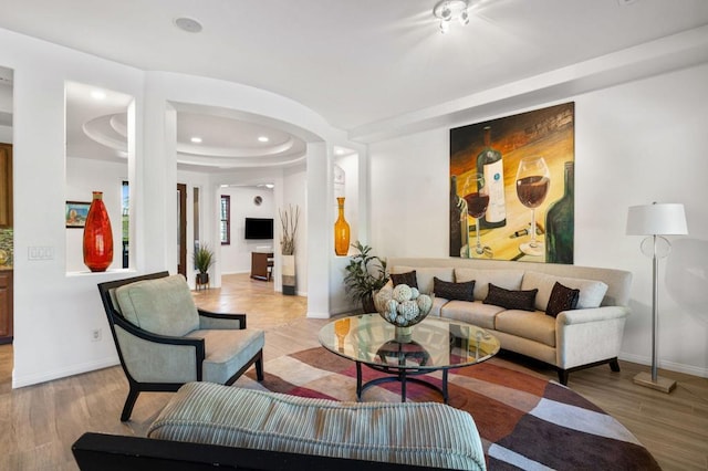 living room with light hardwood / wood-style flooring