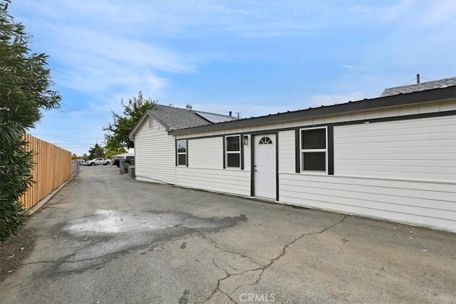 single story home featuring a patio