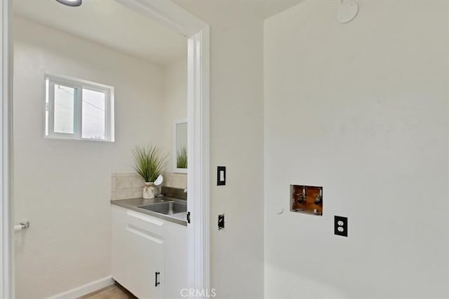 laundry area with sink and washer hookup