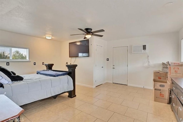 tiled bedroom with ceiling fan and a wall unit AC