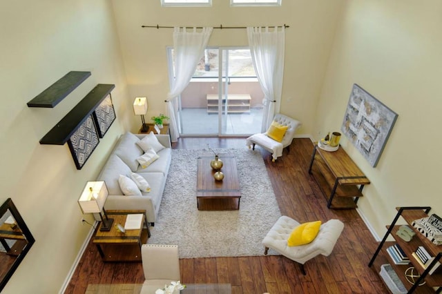 living room featuring dark wood-type flooring