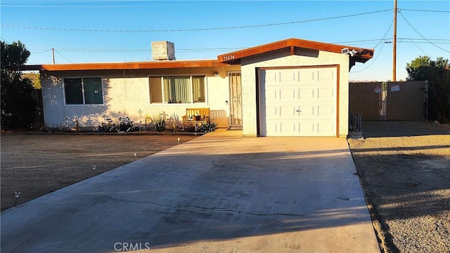 single story home featuring a garage