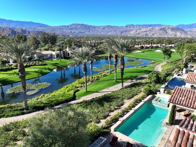 bird's eye view featuring a water and mountain view