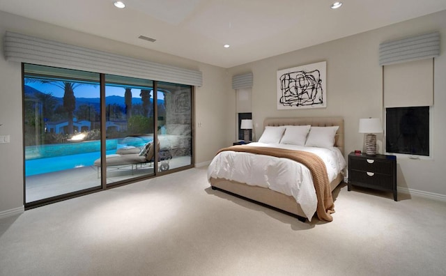 bedroom featuring light carpet and access to outside