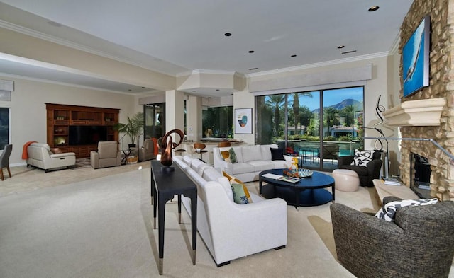 carpeted living room with a fireplace and crown molding