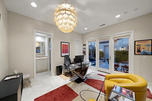 tiled office featuring an inviting chandelier