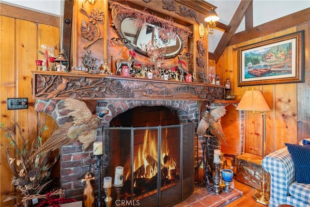 details with hardwood / wood-style flooring, a fireplace, and wooden walls