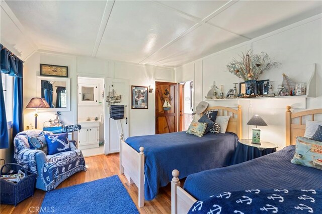 197 Rocky Point Rd, Lake Arrowhead, CA 92352 - bedroom with wood finished floors and connected bathroom