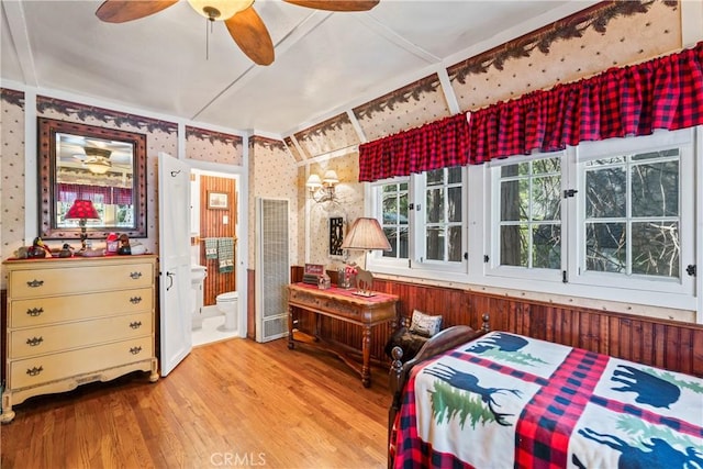 197 Rocky Point Rd, Lake Arrowhead, CA 92352 - bedroom featuring a heating unit, wood finished floors, wallpapered walls, and ensuite bathroom
