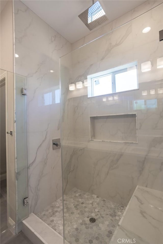 bathroom with an enclosed shower