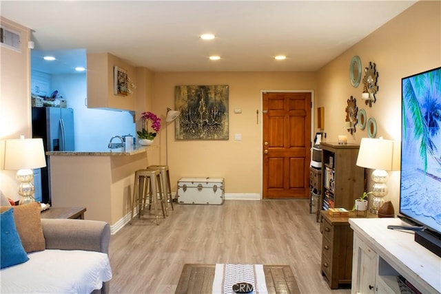18645 Hatteras St Unit 186, Tarzana, CA 91356 - living room with light wood-style floors and recessed lighting