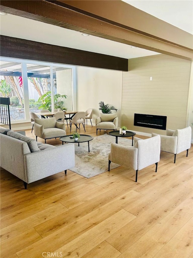 18645 Hatteras St Unit 186, Tarzana, CA 91356 - living room featuring light wood-style flooring and a fireplace