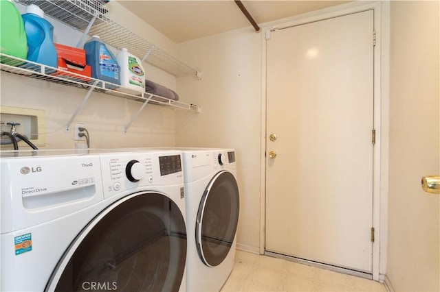 laundry area featuring separate washer and dryer