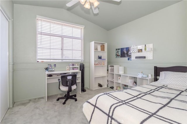 bedroom featuring light colored carpet, ceiling fan, and lofted ceiling