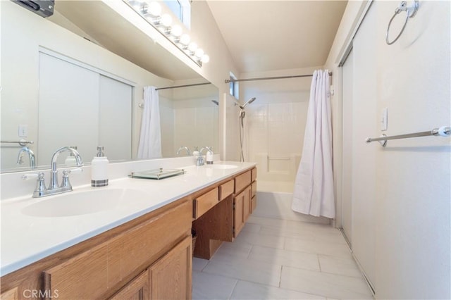 bathroom featuring tile patterned flooring, shower / bath combination with curtain, and vanity