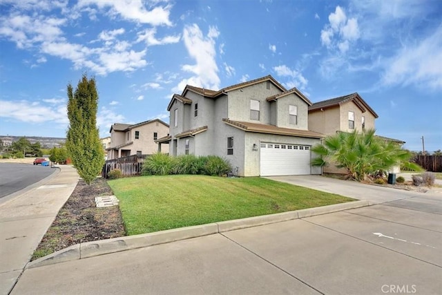 view of front facade with a front lawn and a garage