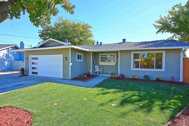 single story home with a front lawn and a garage