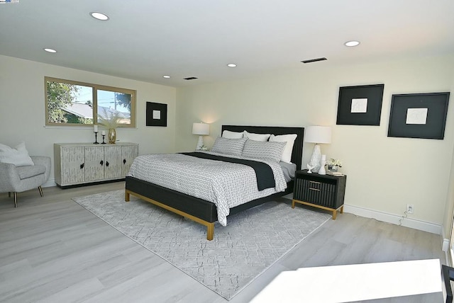 bedroom featuring light hardwood / wood-style flooring