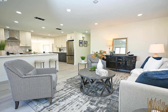 living room featuring light hardwood / wood-style flooring