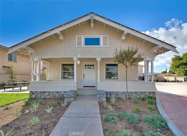 bungalow featuring a porch