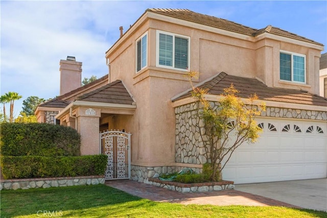 view of front of home with a garage