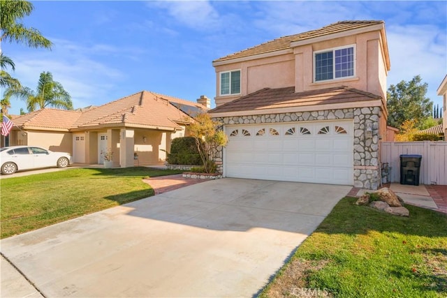 front of property with a front lawn and a garage